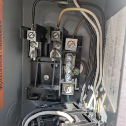 O C Breeze Heating & Air Conditioning - Original view of damaged breaker  connection - white wire.