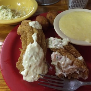 David's Catfish House - Two catfish filets, cheese grits, hushpuppies and perfect coleslaw. - Southern Near Me - Monroeville, Alabama