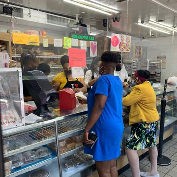 Allan’s Bakery - Pastry counters filled with black cake and tarts - Bakeries Near Me - Brooklyn, New York
