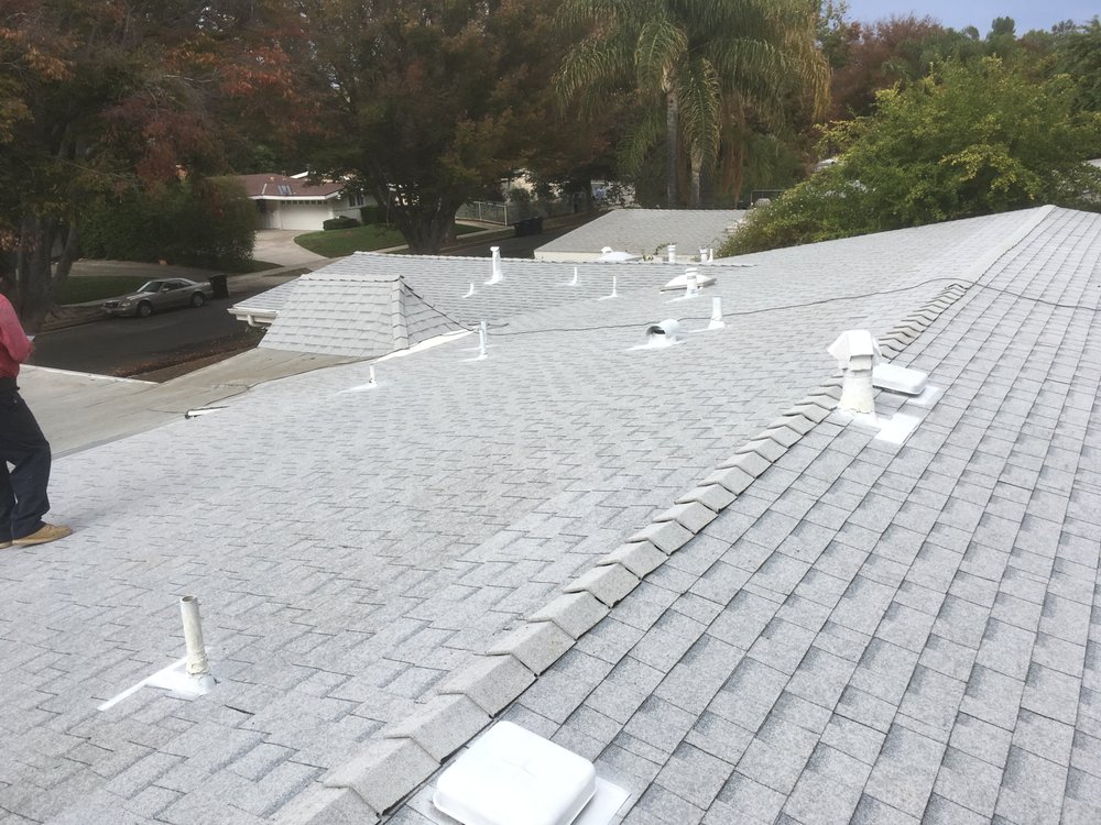 Slide of Lopez Roofing & Construction