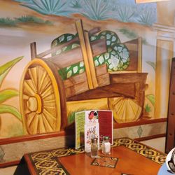 A mural. The place is full of well painted artwork.
