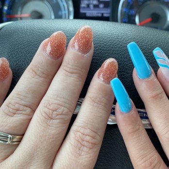 N T Nails Meas - Mine and my daughters nails. She has a fire blue design on her nail. - Nail Salons Near Me - Canton, Georgia