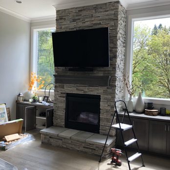 Elite Home AV - Tv 
Mounted on Stone - Home Theatre Installation Near Me