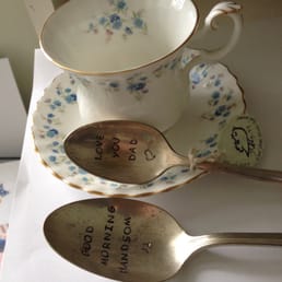 Bought, hand stamped vintage silver spoons and a pretty tea cup and saucer, nice! Bought, hand stamped vintage silver spoons and a pretty tea cup and saucer, nice!