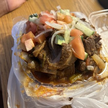 La Playa Supermarket - Goat with veggies (Dominican hot food counter with super fresh food and great prices - Grocery Near Me - Miami Beach, Florida