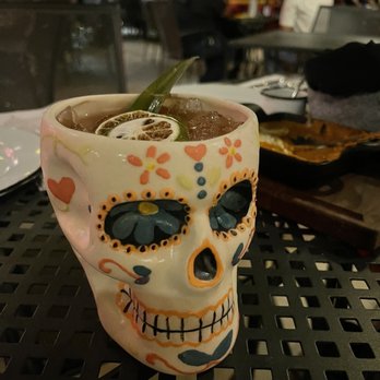 Mula Cantina - a skull mug with a drink in it - Mexican Near Me - McAllen, Texas Mula Cantina - a skull mug with a drink in it - Mexican Near Me - McAllen, Texas