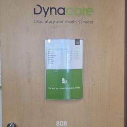 Dynacare - Entrance door and business hours