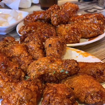 Choong Man Chicken - Gainesville - Back is the spicy garlic. Front spicy red tikkudak. - Korean Near Me - Gainesville, Virginia