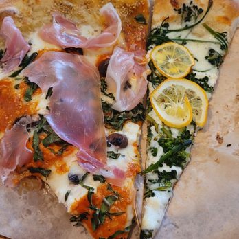 Marley G’s pizzeria - Left: Full slice of seasonal sesame vodka pizza. Right: Half slice of broccolini and lemon slice pizza. - Salad Near Me - Alameda, California Marley G’s pizzeria - Left: Full slice of seasonal sesame vodka pizza. Right: Half slice of broccolini and lemon slice pizza. - Salad Near Me - Alameda, California
