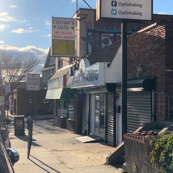 Plattaking - a view of a street in a small town - Soul Food Near Me - Baltimore, Maryland