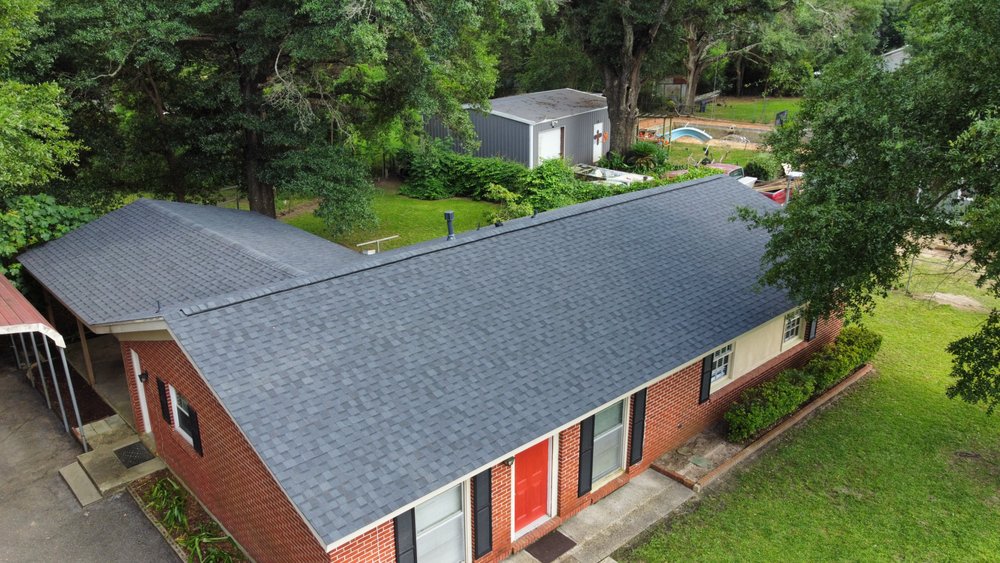 Slide of RainTight Roofing & Construction