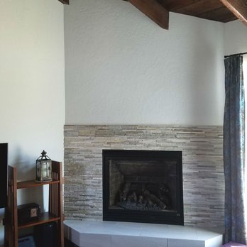 Tileshop - Creamish tile on top and edge of hearth came from here. Works perfectly with the stone. - Building Supplies Near Me - Berkeley, California
