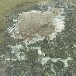 TimberCreek Golf Club - This is one of the greens. Absolutely terrible.