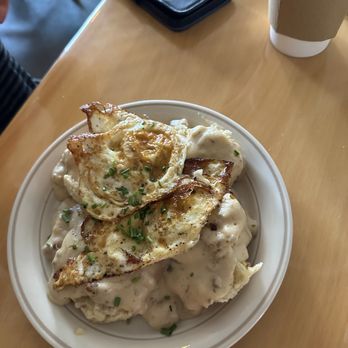 Love Handle - Biscuits and gravy with eggs on top. - Delis Near Me - Indianapolis, Indiana Love Handle - Biscuits and gravy with eggs on top. - Delis Near Me - Indianapolis, Indiana