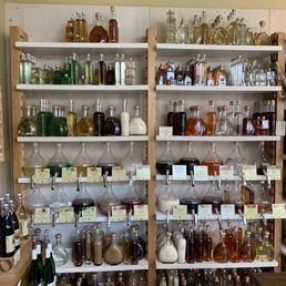 a shelf full of bottles and jars