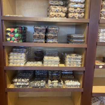 Queens Pita - shelves of various types of doughnuts - Bakeries Near Me - Flushing, New York