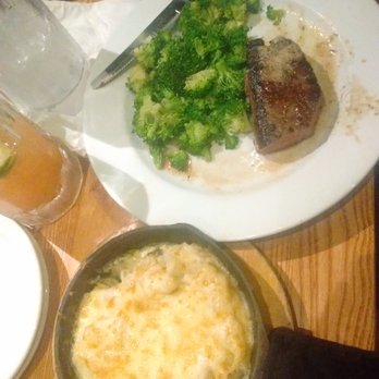 Chili's - Dad ordered the 6oz steak. The potatoes had a thick layer of cheese on top! Yumm  (Not the best photo) - American Near Me - Goleta, California