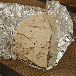 Aman's Indian Bistro - Single piece of (crushed) papadum. No sauces.