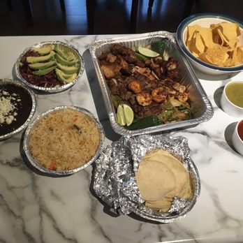 Tequila Comida & Cantina - $30 take out special photo does not do justice to the layers of carne, pollo, carnitas and camarón, on top of veggies - Mexican Near Me - Wilmington, North Carolina Tequila Comida & Cantina - $30 take out special photo does not do justice to the layers of carne, pollo, carnitas and camarón, on top of veggies - Mexican Near Me - Wilmington, North Carolina