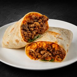 A hearty 13-inch flour tortilla filled with your choice of protein, beans, cheese, rice, onion, and cilantro.