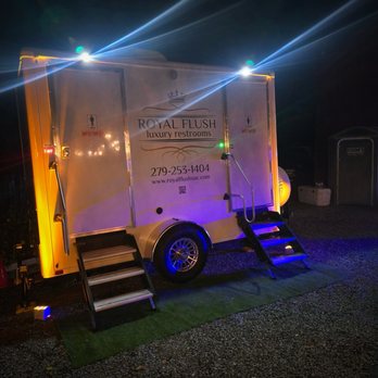 Royal Flush Luxury Restrooms - Evening elegance our luxury restroom trailer lit up beautifully for a wedding under the stars Comfort, class, and cleanliness - Portable Toilet Services Near Me Royal Flush Luxury Restrooms - Evening elegance our luxury restroom trailer lit up beautifully for a wedding under the stars Comfort, class, and cleanliness - Portable Toilet Services Near Me