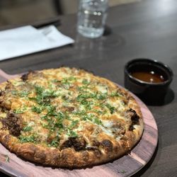 Birria Love - Birria pizza with consumme