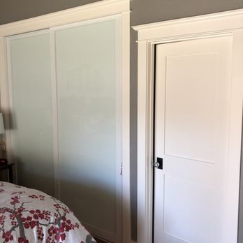 John Romeo Construction - a bedroom with a bed and a closet - General Contractors Near Me - Sonoma, California John Romeo Construction - a bedroom with a bed and a closet - General Contractors Near Me - Sonoma, California