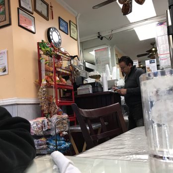 Vina Del Mar - a woman at a restaurant - Salvadoran Near Me - Jamaica, New York Vina Del Mar - a woman at a restaurant - Salvadoran Near Me - Jamaica, New York