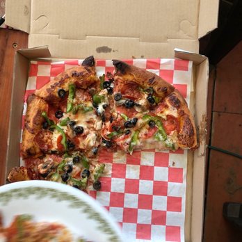 Black Rock Pizza - Captain Cook - Uncooked pizza - Pizza Near Me - Captain Cook, Hawaii Black Rock Pizza - Captain Cook - Uncooked pizza - Pizza Near Me - Captain Cook, Hawaii