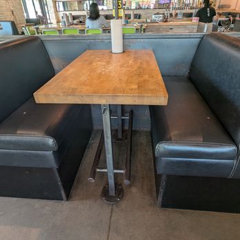 Hopdoddy Burger Bar - A great idea - footrests for the booths! - Burgers Near Me - College Station, Texas Hopdoddy Burger Bar - A great idea - footrests for the booths! - Burgers Near Me - College Station, Texas