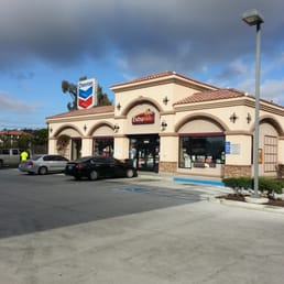 a car parked in front of a restaurant