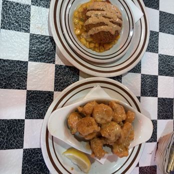 Acme Oyster House - Crab Cake (top) and Boom Boom Shrimp (bottom) - Seafood Near Me - New Orleans, Louisiana Acme Oyster House - Crab Cake (top) and Boom Boom Shrimp (bottom) - Seafood Near Me - New Orleans, Louisiana