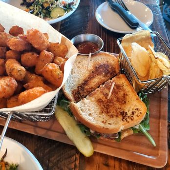 Finney's Crafthouse - Stevenson Ranch - Tri Tip Sandwich with a basket of tots - New American Near Me - Stevenson Ranch, California