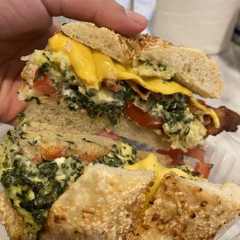Laurel Street Bakery - Second visit: custom breakfast sandwich the barista made for me. Spinach, bacon, feta, Tomatoes on onion garlic bagel - Bakeries Near Me - New Orleans, Louisiana Laurel Street Bakery - Second visit: custom breakfast sandwich the barista made for me. Spinach, bacon, feta, Tomatoes on onion garlic bagel - Bakeries Near Me - New Orleans, Louisiana