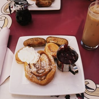 Carnation Cafe - Mickey waffle! (chicken sausage and a side of strawberry syrup) - American Near Me - Anaheim, California Carnation Cafe - Mickey waffle! (chicken sausage and a side of strawberry syrup) - American Near Me - Anaheim, California
