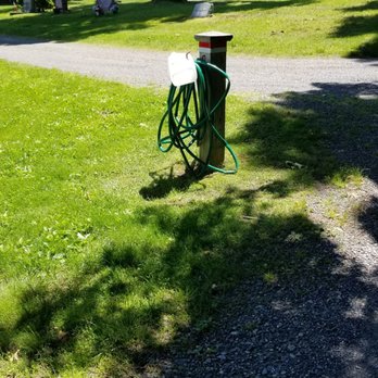 Atkinson Cemetery - Watering hoses throughout the property for families to use. - Funeral Services & Cemeteries Near Me - Atkinson, New Hampshire