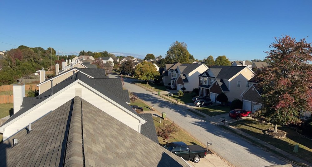 Slide of Noble Roofing