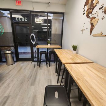 Presotea - tables and stools in a coffee shop - Bubble Tea Near Me - Kissimmee, Florida Presotea - tables and stools in a coffee shop - Bubble Tea Near Me - Kissimmee, Florida