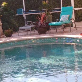 Keller Pools - a pool with a lounge chair - Pool & Hot Tub Service Near Me - Cape Coral, Florida Keller Pools - a pool with a lounge chair - Pool & Hot Tub Service Near Me - Cape Coral, Florida