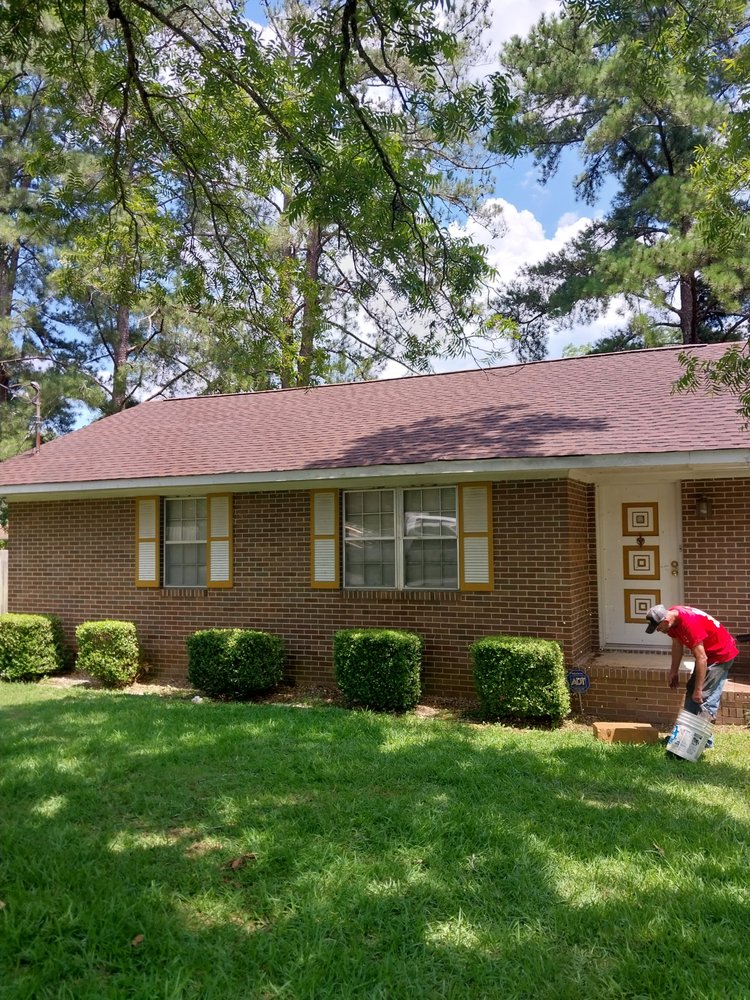 Slide of Tyndal Roofing