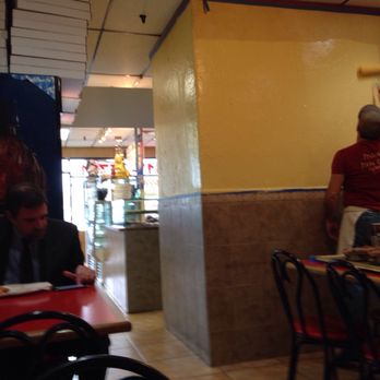 Francesco's - a man painting the walls of a restaurant - Italian Near Me - Islip Terrace, New York Francesco's - a man painting the walls of a restaurant - Italian Near Me - Islip Terrace, New York