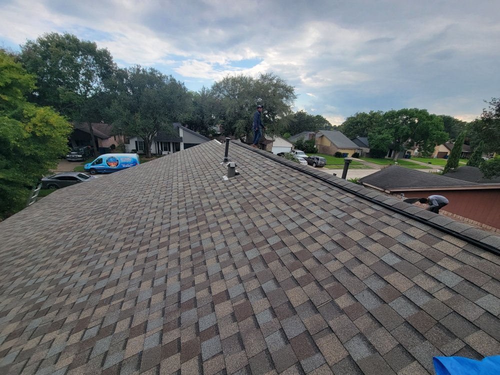 Slide of Dave's Discount Roofing