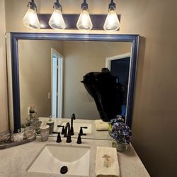 Framed the mirror.