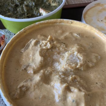 Delhi Diner - Saag Paneer (background) ; coconut chicken curry (front) - Indian Near Me - Albany, California Delhi Diner - Saag Paneer (background) ; coconut chicken curry (front) - Indian Near Me - Albany, California