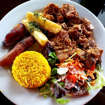 Sofrito Latin Cafe - Pork plate. Three sides. Yellow rice, sweet plantains and fried Yucca. $9.00. - Latin American Near Me - Orlando, Florida Sofrito Latin Cafe - Pork plate. Three sides. Yellow rice, sweet plantains and fried Yucca. $9.00. - Latin American Near Me - Orlando, Florida