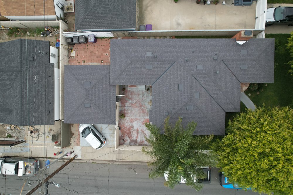 Slide of Enriquez Roofing