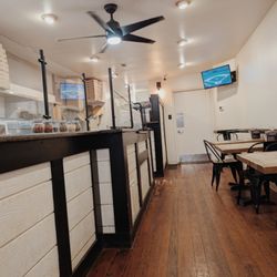 The Angelo Pizza - A view of the tables and the TV