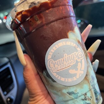 Cravings Ice Cream - Cookie Monster shake with chocolate drizzle, whipped cream, and Oreo and Cookie Crisp on top. - Ice Cream & Frozen Yogurt Near Me - Bellflower, California Cravings Ice Cream - Cookie Monster shake with chocolate drizzle, whipped cream, and Oreo and Cookie Crisp on top. - Ice Cream & Frozen Yogurt Near Me - Bellflower, California