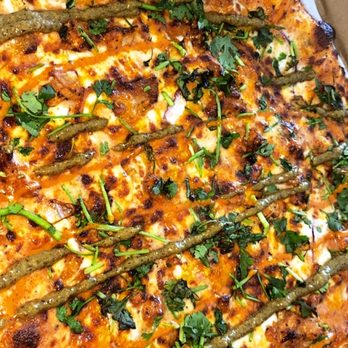 Pizza Boyz - Chicken Tikka Masala Pizza ,No Veggies simply drizzled with Jerk Sauce & Cilantro! - Pizza Near Me - Citrus Heights, California Pizza Boyz - Chicken Tikka Masala Pizza ,No Veggies simply drizzled with Jerk Sauce & Cilantro! - Pizza Near Me - Citrus Heights, California