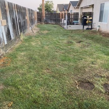 Romo Concrete - Before, uneven ground, and holes. Poorly poured patio extension removed to enhance yard. - Masonry/Concrete Near Me Romo Concrete - Before, uneven ground, and holes. Poorly poured patio extension removed to enhance yard. - Masonry/Concrete Near Me